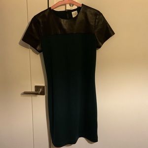 Green dress with black leather top
